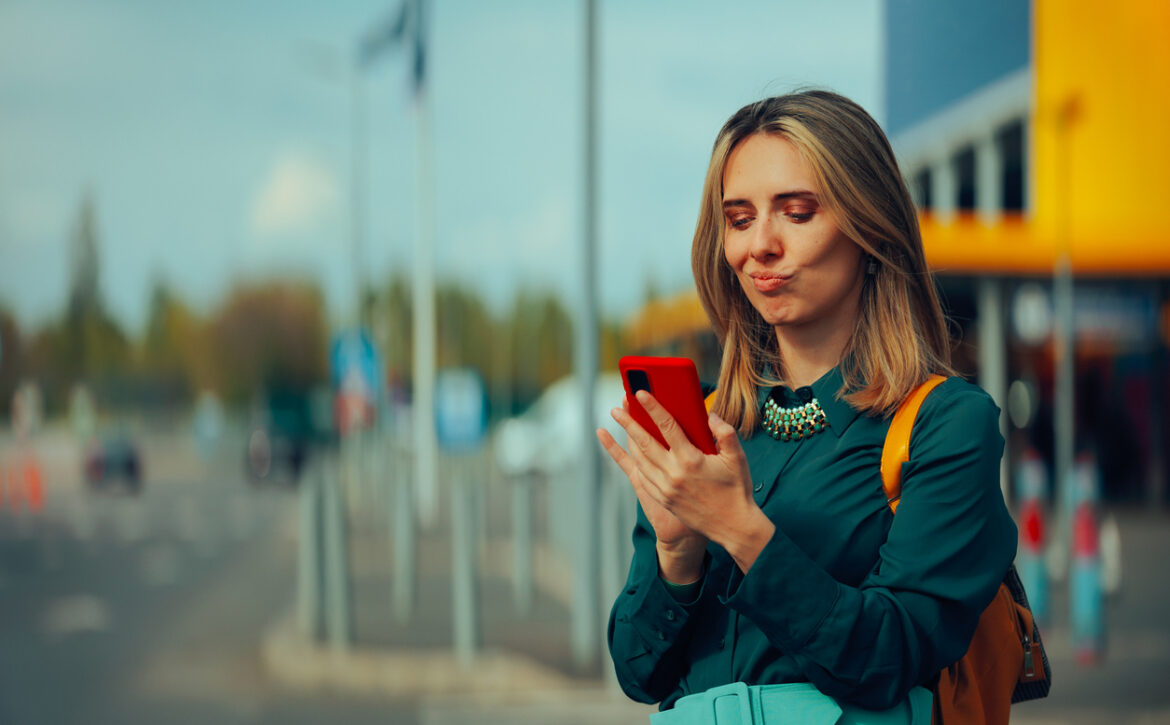 Funny Woman Checking her Mobile Phone