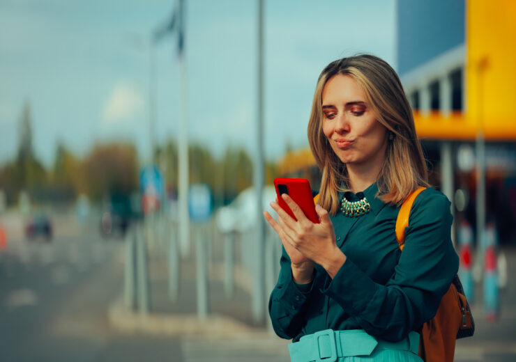 Funny Woman Checking her Mobile Phone