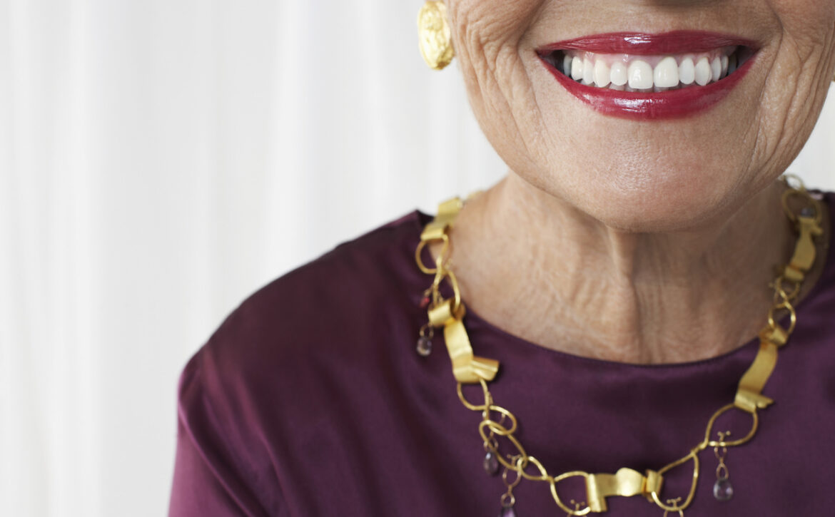 Closeup Midsection Of Smiling Senior Woman