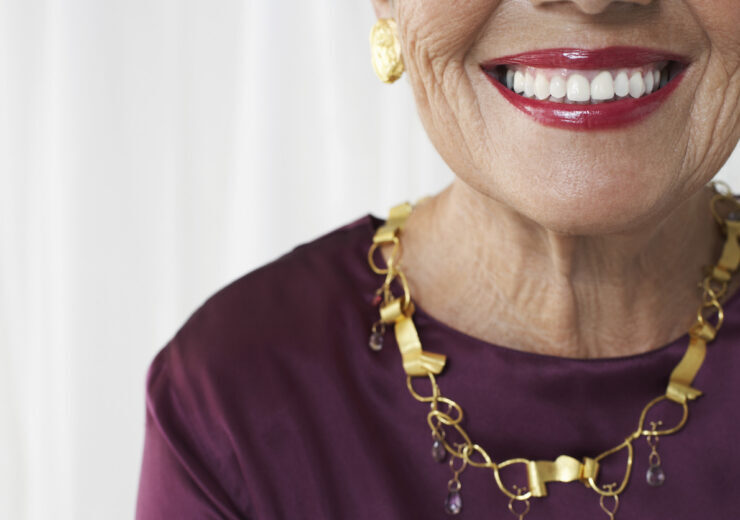 Closeup Midsection Of Smiling Senior Woman