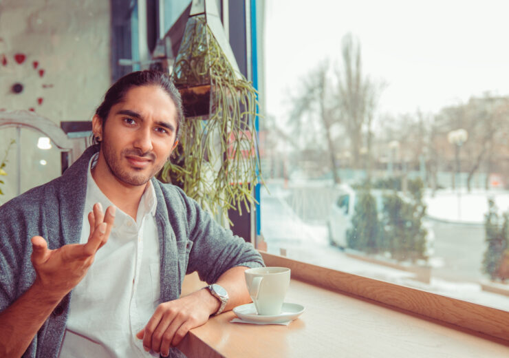 Frustrated man gesturing what do you want from me, so what, I don't know