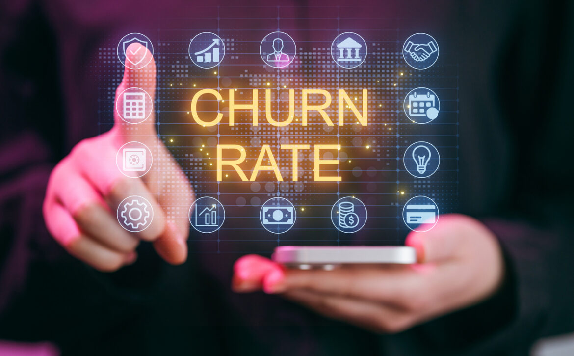 Focus on churn rate analysis through digital dashboard with user interaction in modern office setting