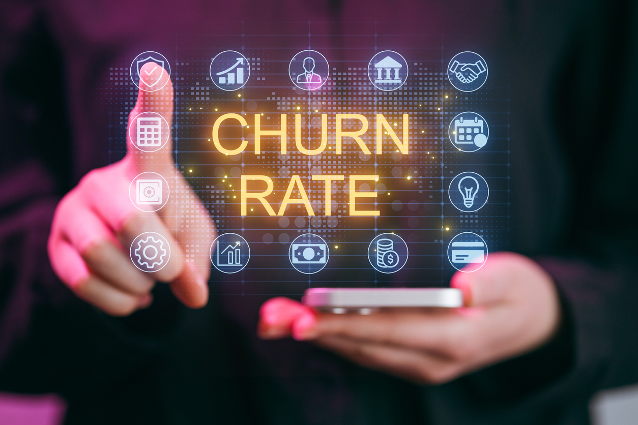 Focus on churn rate analysis through digital dashboard with user interaction in modern office setting