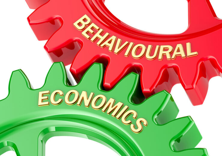 Behavioral Economics concept, with colored gearwheels. 3D rendering